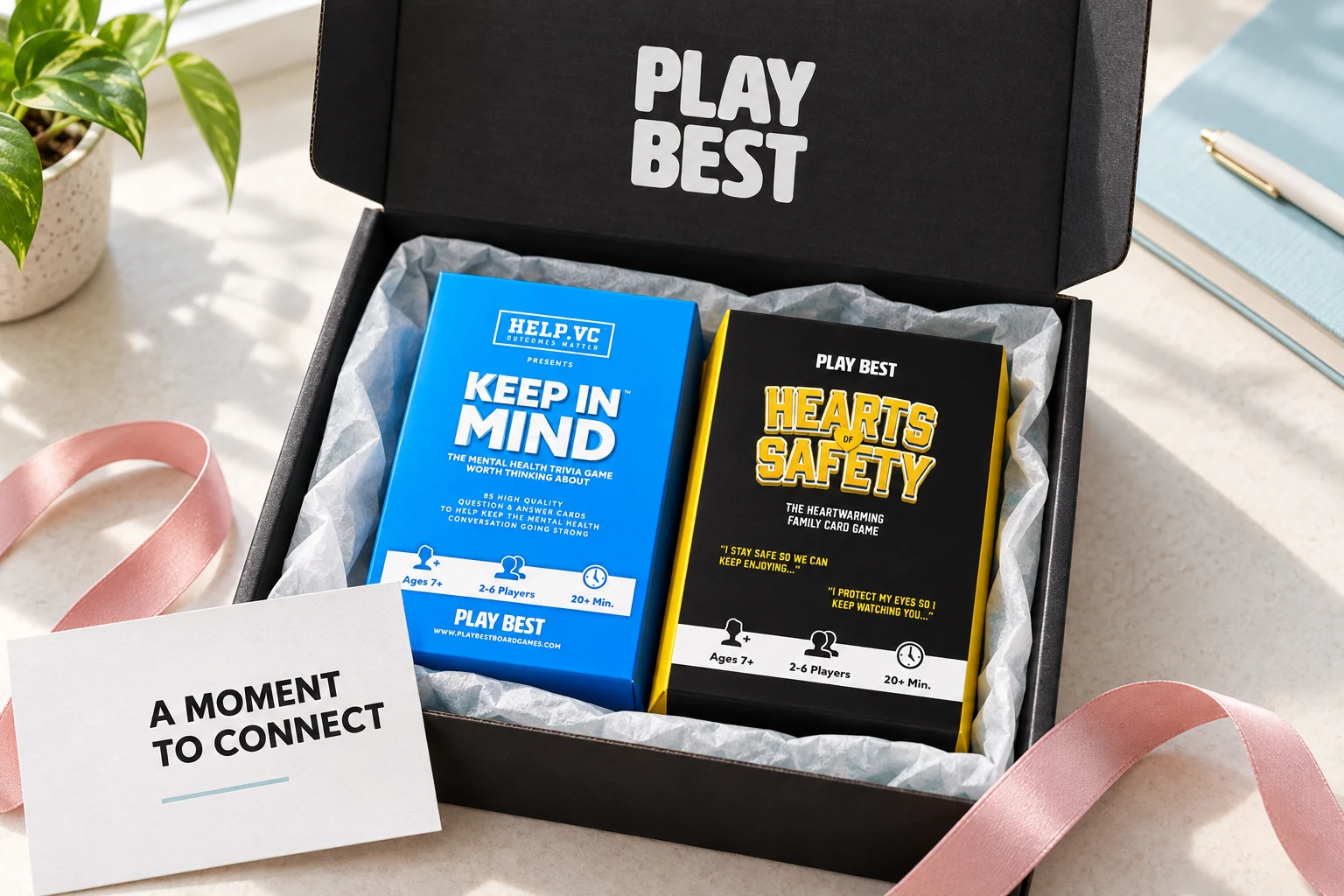 An open PlayBest wellness gift box with Keep in Mind, Hearts of Safety and a note saying A moment to connect