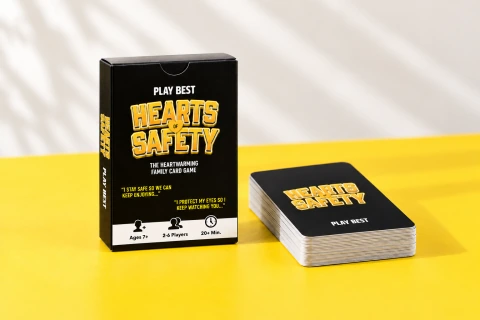 Hearts of Safety box and black-and-yellow card deck
